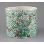 A Chinese famille verte brush pot, Kangxi mark but late 19th century, painted with prunus,