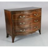 A George III mahogany bowfront chest, with chevron strung top, brushing slide and three graduated