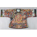 A Chinese embroidered silk and gold thread 'dragon' jacket, late Qing dynasty, the gold thread