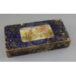 A Tibetan painted wood painting box, 19th century, the cover decorated with the figure of luohan