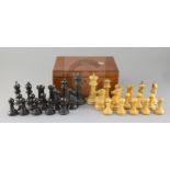 A Jaques & Son ebony and boxwood club sized Staunton pattern chess set, in mahogany box, kings 4.