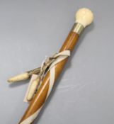 An ivory topped malacca cane length in total 91cm