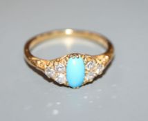 An early 20th century 18ct, single stone turquoise and six stone diamond set dress ring, size T/U.