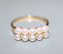 A modern Mikimoto 18ct gold, ten cultured pearl and four stone diamond set half hoop dress ring,