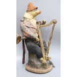 A French automaton of a pig playing a harp, late 19th century