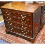 A small George III mahogany chest with brushing slide W.84cm