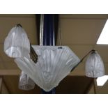 An Art Deco three-branch 4-light frosted glass shaded light, signed Degue