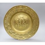 A 19th century embossed brass dish, etched to the reverse "To the use of Lexden Church as a Thank