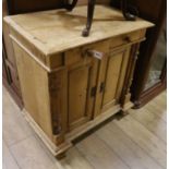 A small 19th century Continental pine cupboard W.78cm