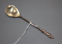 A white metal apostle spoon, with engraved inscription 'S Geadda (Chad) A.D. 672' 18.2cm.