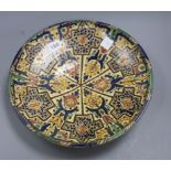 A Moroccan polychrome pottery dish