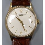 A gentleman's 1960's 9ct gold Longines manual wind wrist watch, with Arabic and baton numerals, on
