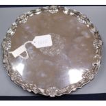 A George III silver salver, London, 1778 (repairs), 27.8cm, 21 oz.