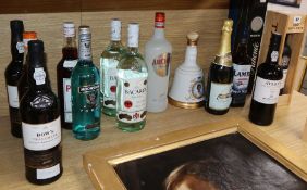 Fourteen assorted spirits etc, including Bacardi, Lamb's Navy Rum, Wade Queens 60th Birthday Bell'