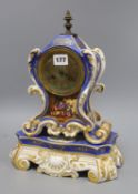 A French porcelain clock on stand H.38cm