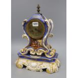 A French porcelain clock on stand H.38cm