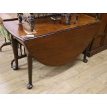 A George III mahogany drop leaf pad foot dining table W.126cm