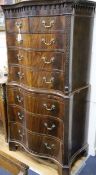 A 1920's Chippendale revival serpentine mahogany chest on chest W.90cm