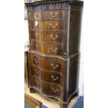 A 1920's Chippendale revival serpentine mahogany chest on chest W.90cm