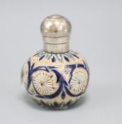 A Doulton Lambeth silver-topped globular perfume bottle, by Frances E Lee, dated 1879, the pump