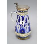 Florence E Barlow for Doulton Lambeth - a foliate incised jug with plated mount, dated 1879,