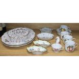 A collection of Herend porcelain tableware, including two oval serving dishes, one decorated with