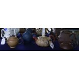 Five Chinese Yixing teapots and a Republic period wine pot