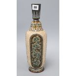 A Doulton Lambeth slender bottle vase, by Florence E Lewis, dated 1879, with foliate panels on a