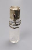 An Edwardian silver mounted glass scent bottle with serpent collar and cabochon button, Levi &