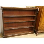 A Victorian mahogany open fronted bookcase W.146cm