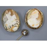 A yellow metal mounted oval cameo brooch, one other cameo brooch and a stick pin.