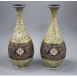 A pair of large Royal Doulton stoneware bottle vases, c.1905, with flower and Art Nouveau style