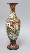 An early Doulton Lambeth faience vase, by Eliza Simmance, dated 1877, painted with apple blossom