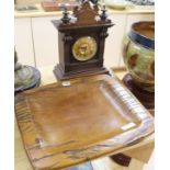 An American mantel clock and a carved hardwood dish