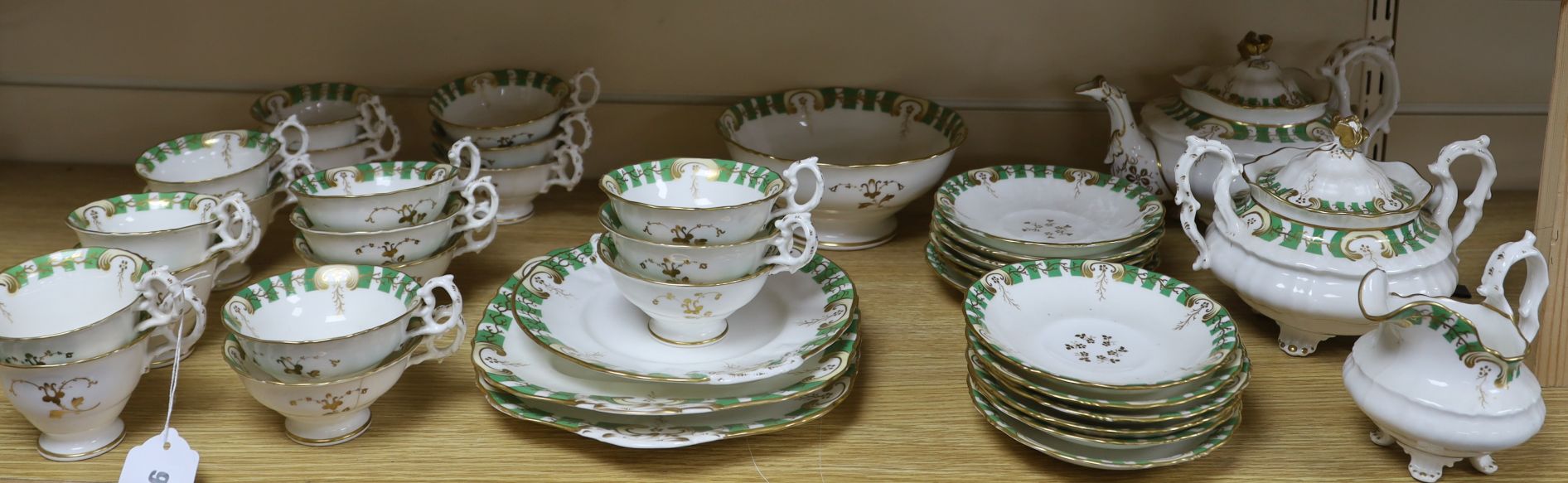 A 19th century Staffordshire gilt and green decorated teaset