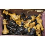 A quantity of chess pieces including turned wood and bone