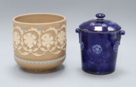 A Doulton silicon ware jardiniere and a blue glazed biscuit barrel and cover, shape 8510, jardiniere
