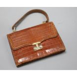 A pre-war crocodile skin handbag