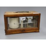 An early 20th century oak cased barograph