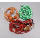 Assorted necklaces including jade and agate.