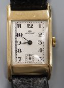 A gentleman's early 1940's 9ct gold Audax manual wind wrist watch, with rectangular Arabic dial