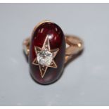 A star-set diamond and garnet cabochon ring, yellow metal setting (tests as 9ct), size J.