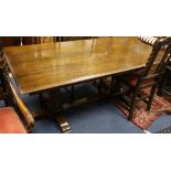 A 17th century style oak refectory table L.185cm