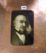 A Sherwin and Cotton ceramic portrait tile of Gladstone in an Arts and Crafts coppered frame