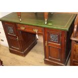 A late Victorian mahogany kneehole desk W.122cm