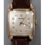 A gentleman's stylish 14k Helvetia manual wind wrist watch, with square Arabic dial and raised lugs,