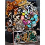 A large quantity of mixed costume jewellery, including silver. amber, malachite etc.