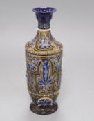 A Doulton Lambeth vase by Florence C. Roberts, dated 1879, incised with foliage between 'jewelled'