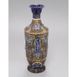 A Doulton Lambeth vase by Florence C. Roberts, dated 1879, incised with foliage between 'jewelled'