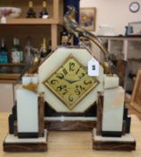 An Art Deco Gauvin, mixed marble clock garniture surmounted with stylised bronze pheasants, signed